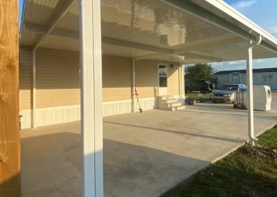 white aluminum carport
