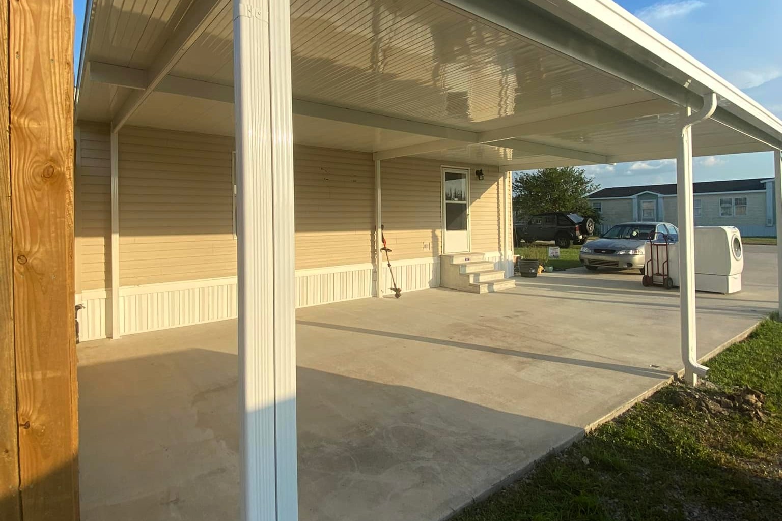 white aluminum carport